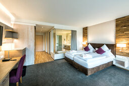 Ein gemütliches Bett für erholsamen Schlaf in der Junior-Suite Schlössla im Hotel Sponsel-Regus